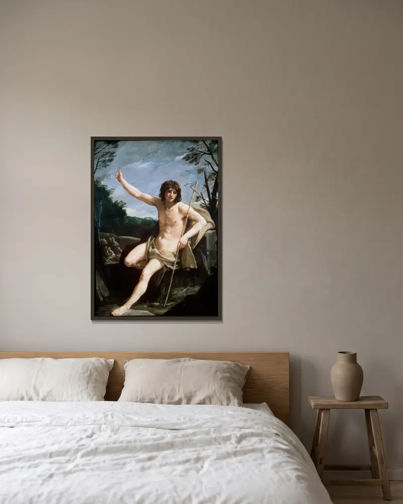 Johannes Döparen i öknen av Guido Reni inramad på en vägg