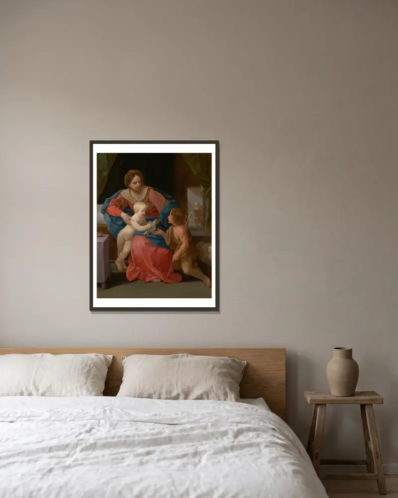 Madonnan med barnet och Johannes Döparen av Guido Reni inramad på en vägg