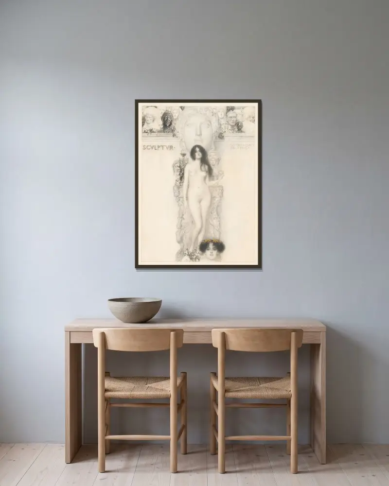 Sculptur av Gustav Klimt inramad på en vägg