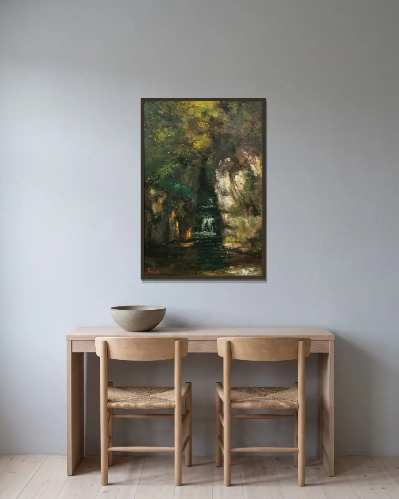 Ein Wasserfall bei Ornans von Gustave Courbet gerahmt an einer Wand