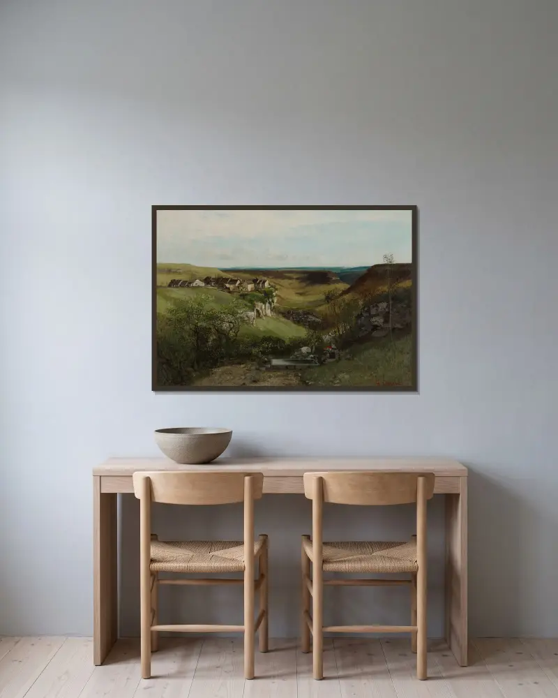 Château d’Ornans av Gustave Courbet inramad på en vägg
