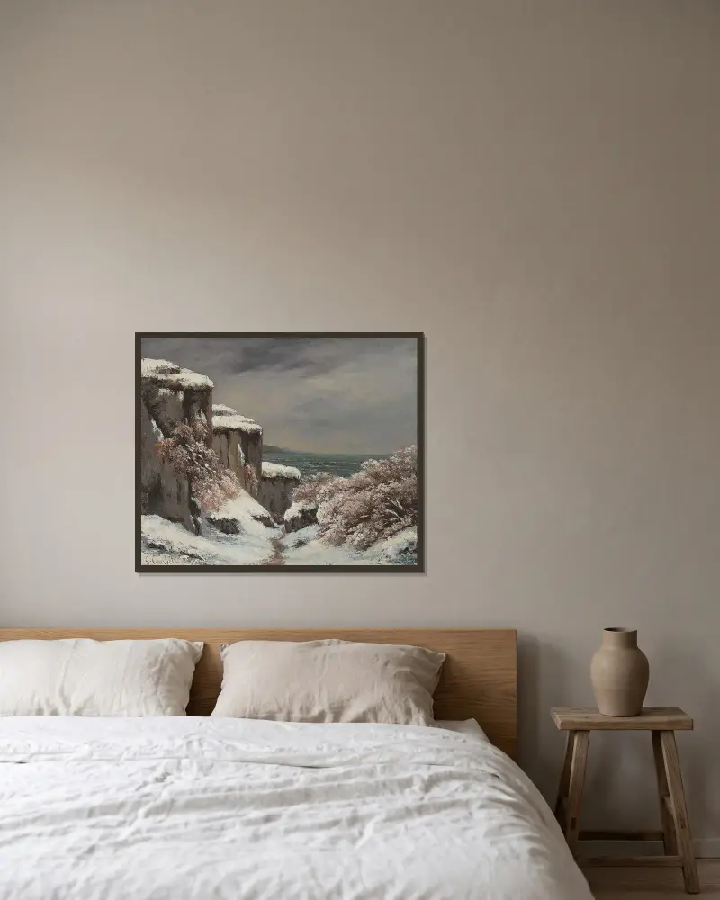 Klippor vid havet i snö av Gustave Courbet inramad på en vägg