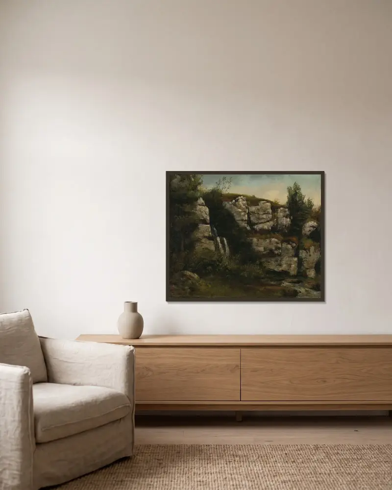 Landskap med klippor och vattenfall av Gustave Courbet inramad på en vägg