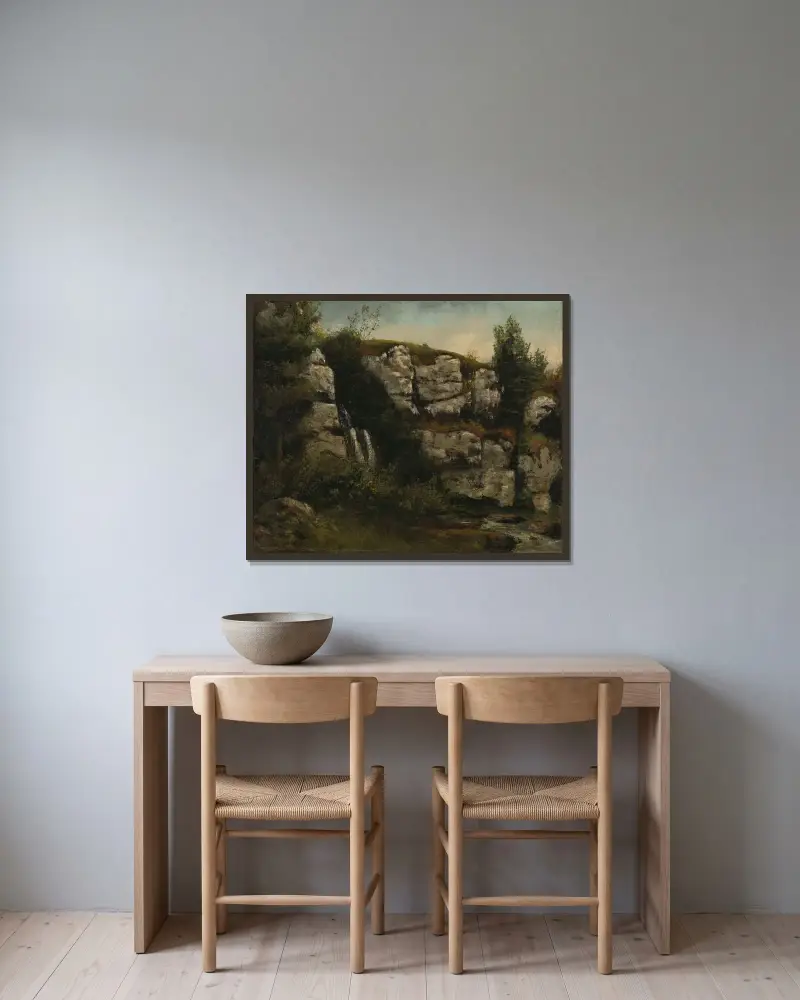 Landskap med klippor och vattenfall av Gustave Courbet inramad på en vägg