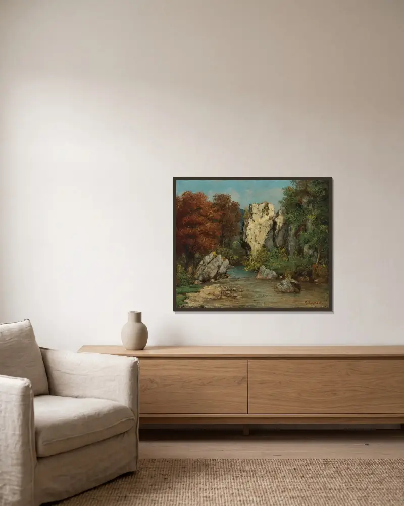 Landskap med bäck och klippa av Gustave Courbet inramad på en vägg