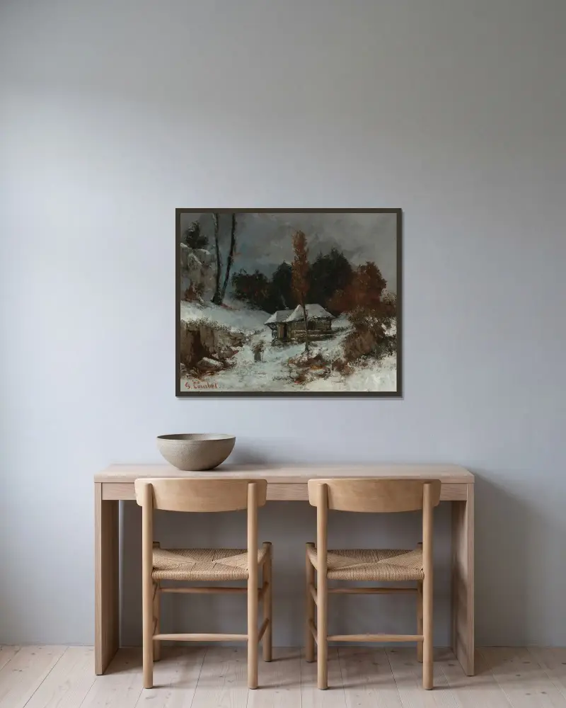 Kvinna med knippe i snölandskap av Gustave Courbet inramad på en vägg