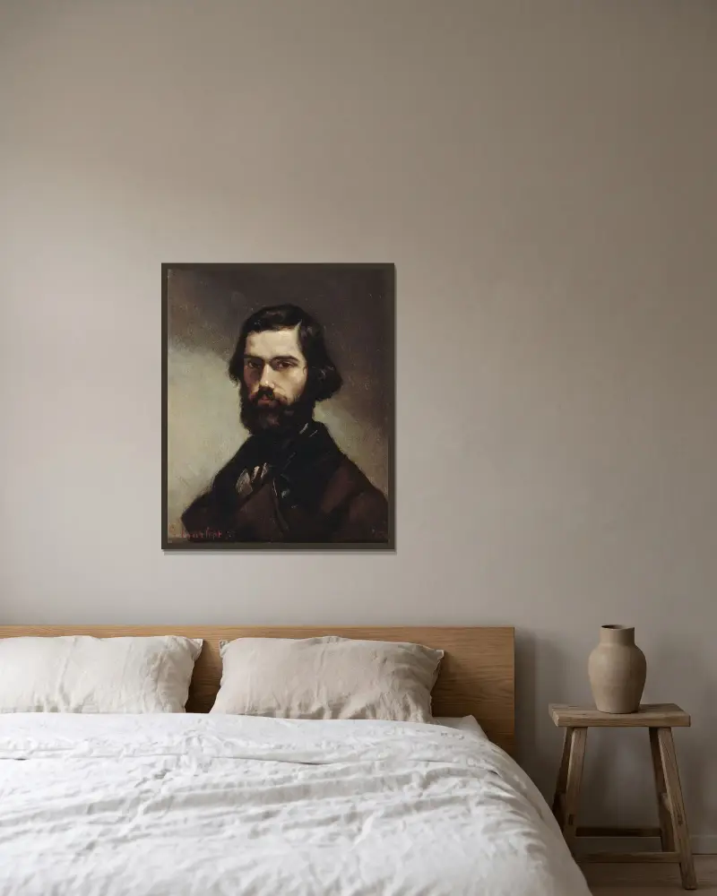 Portrait de Jules Vallès av Gustave Courbet inramad på en vägg