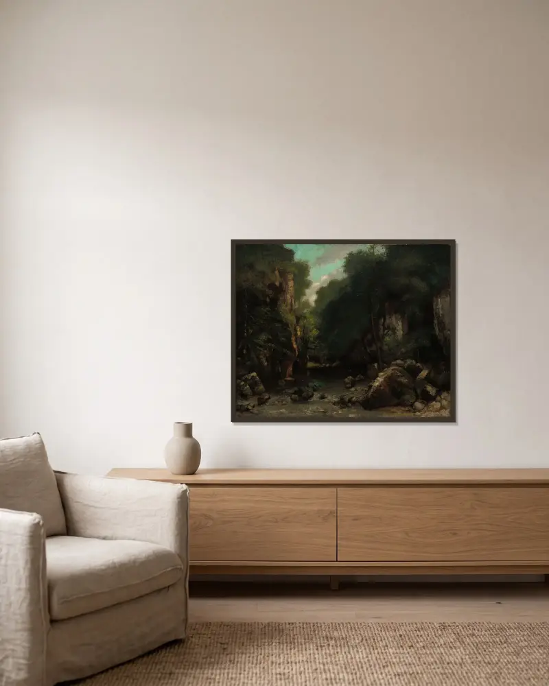 Das Tal von Les Puits-Noir von Gustave Courbet gerahmt an einer Wand