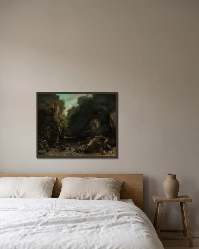 Das Tal von Les Puits-Noir von Gustave Courbet gerahmt an einer Wand