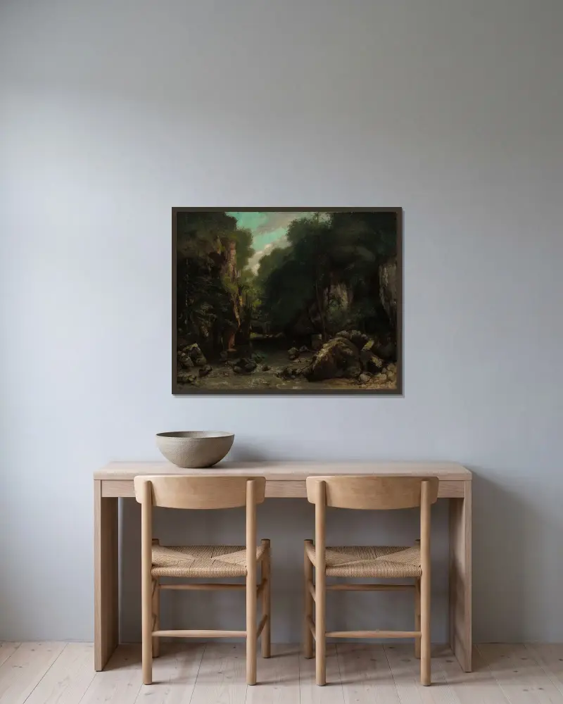 Das Tal von Les Puits-Noir von Gustave Courbet gerahmt an einer Wand