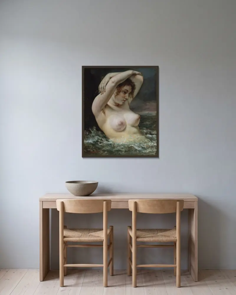 Die Frau in den Wellen von Gustave Courbet gerahmt an einer Wand