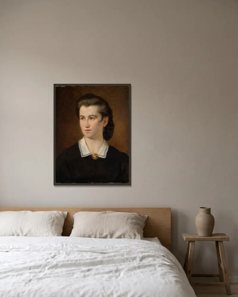 Porträtt av en ung flicka av Hans Canon inramad på en vägg