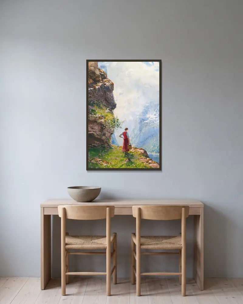 En ung flicka vid en fjord av Hans Dahl inramad på en vägg
