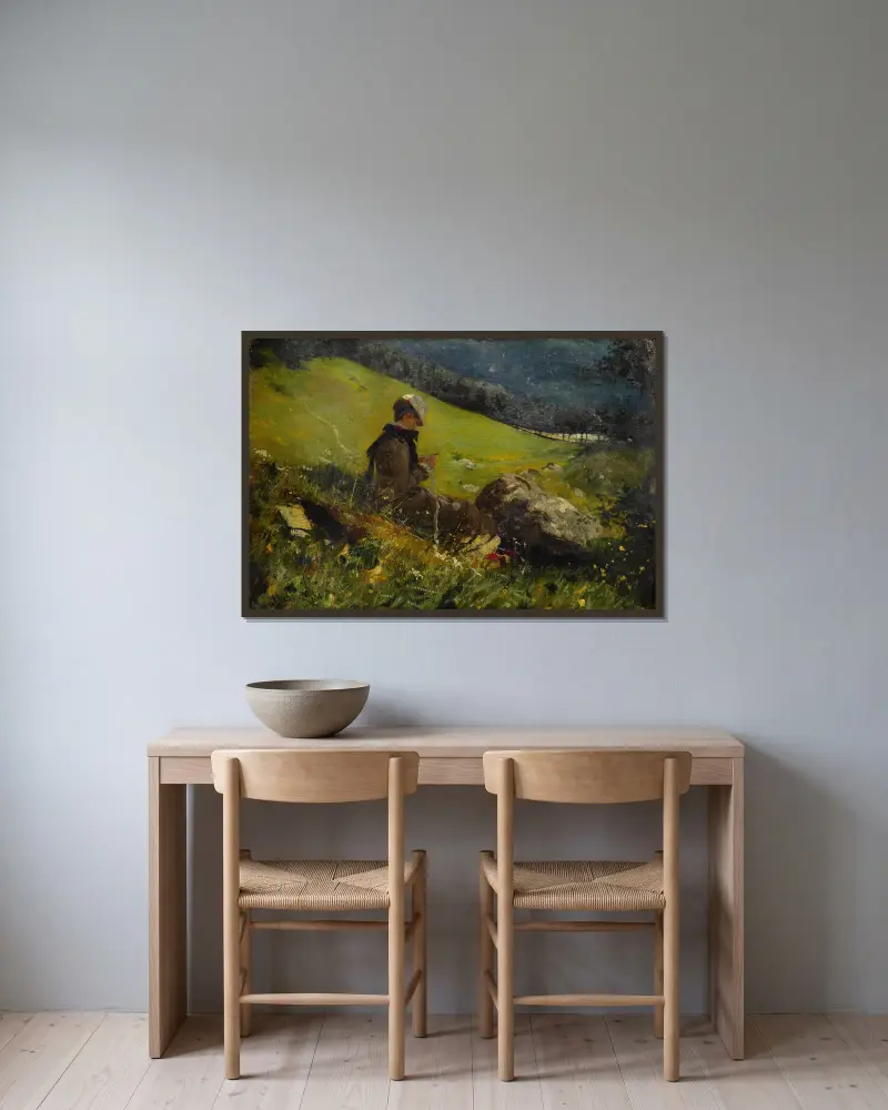 Flicka på en äng som stickar av Hans Dahl inramad på en vägg