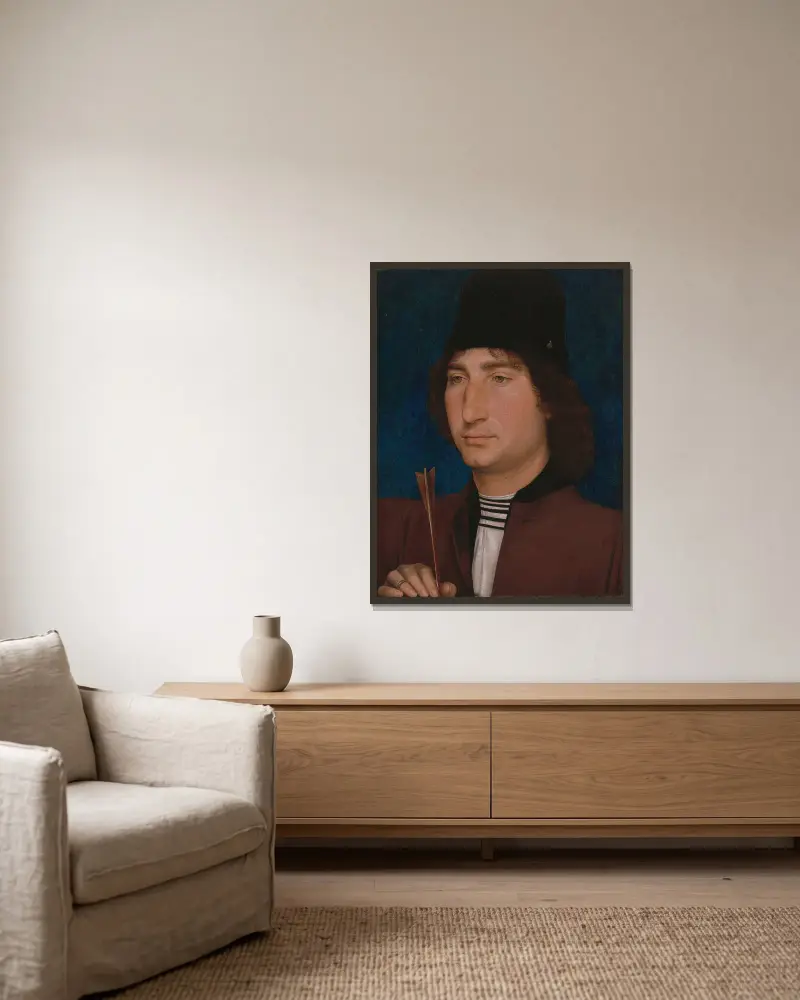 Porträtt av en man med pil av Hans Memling inramad på en vägg