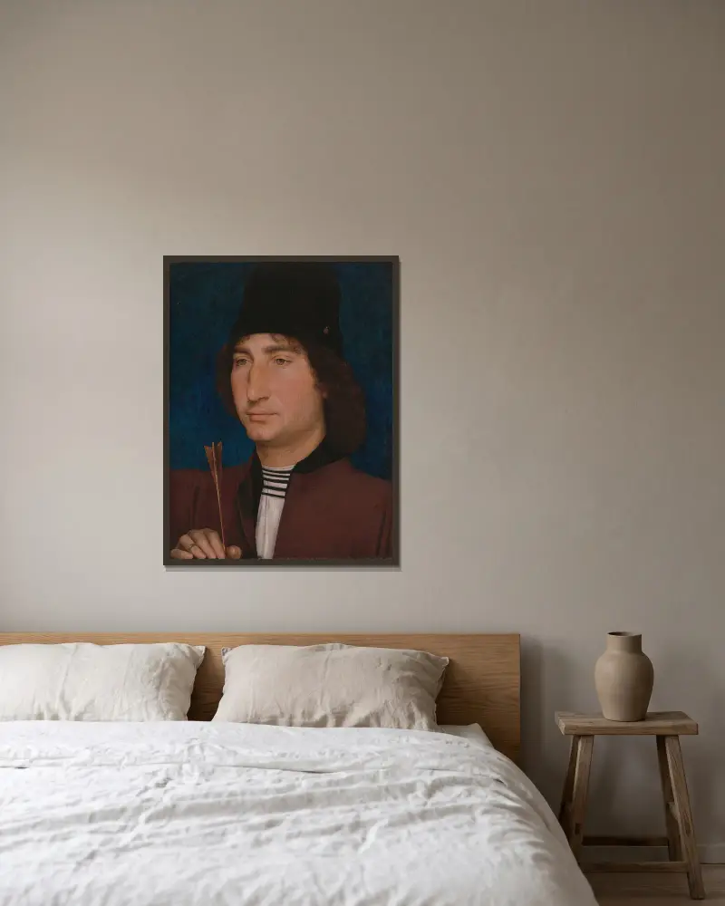 Porträtt av en man med pil av Hans Memling inramad på en vägg