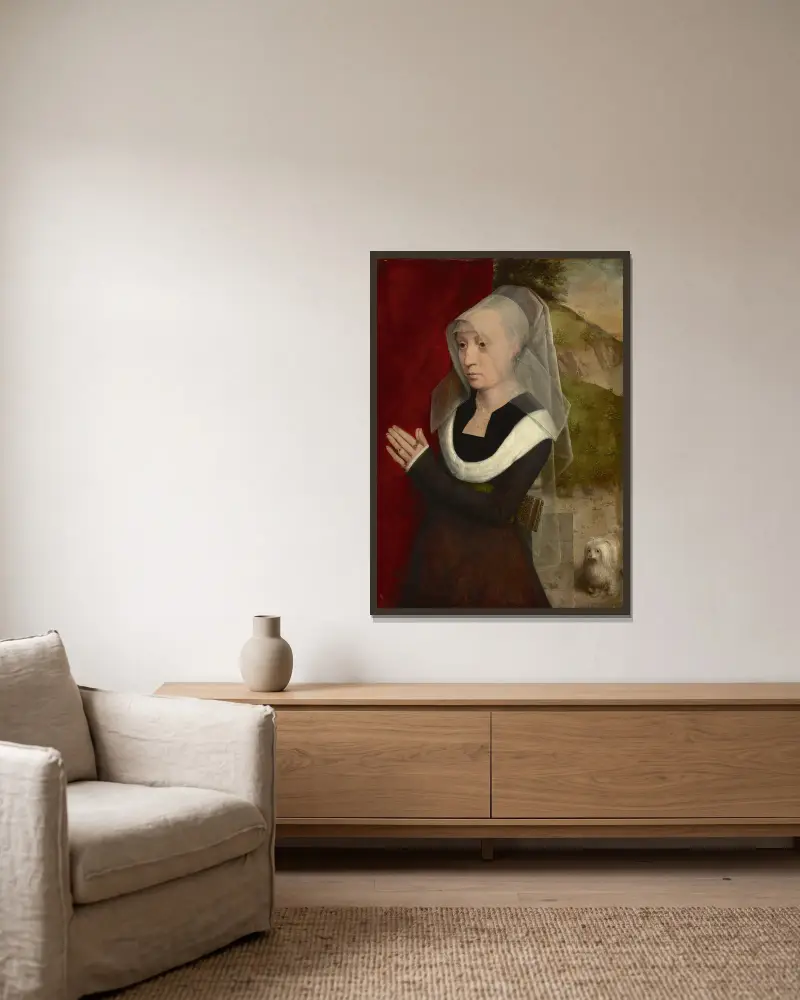 Porträtt av en kvinna i bön av Hans Memling inramad på en vägg