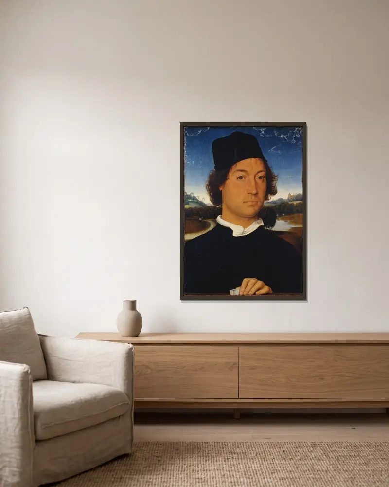Porträtt av en okänd man med ett brev av Hans Memling inramad på en vägg