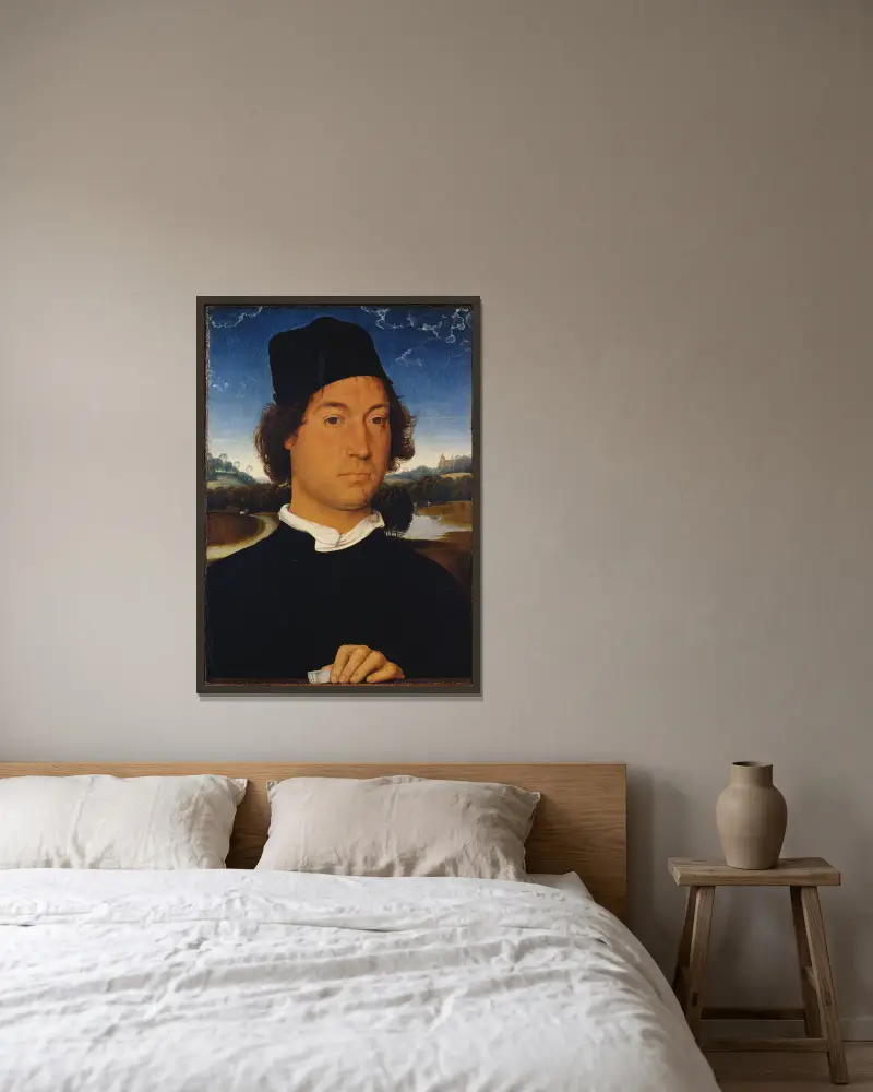 Porträtt av en okänd man med ett brev av Hans Memling inramad på en vägg