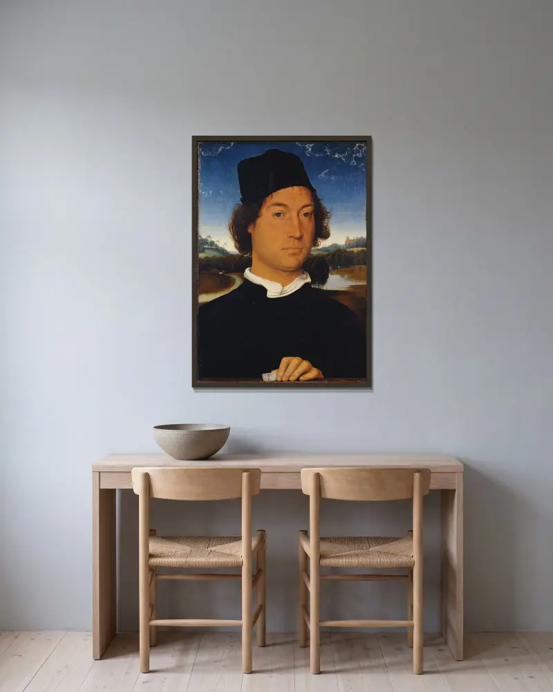 Porträtt av en okänd man med ett brev av Hans Memling inramad på en vägg