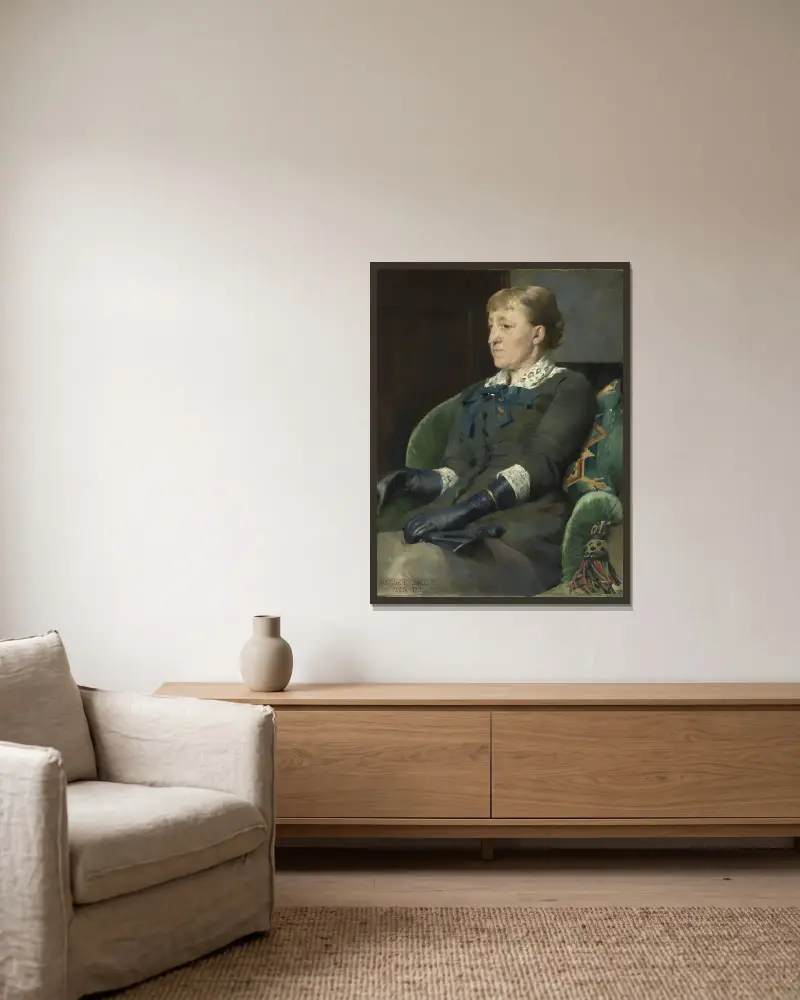 Porträtt av målaren Kitty Kielland av Harriet Backer inramad på en vägg