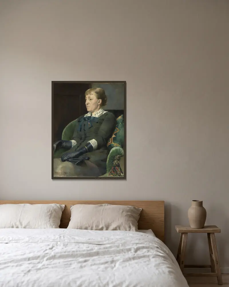 Porträtt av målaren Kitty Kielland av Harriet Backer inramad på en vägg