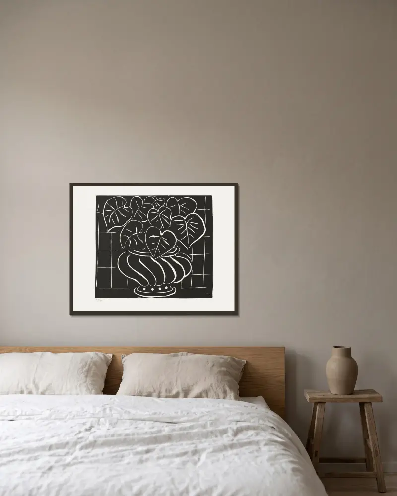 Korg med begonior II av Henri Matisse inramad på en vägg
