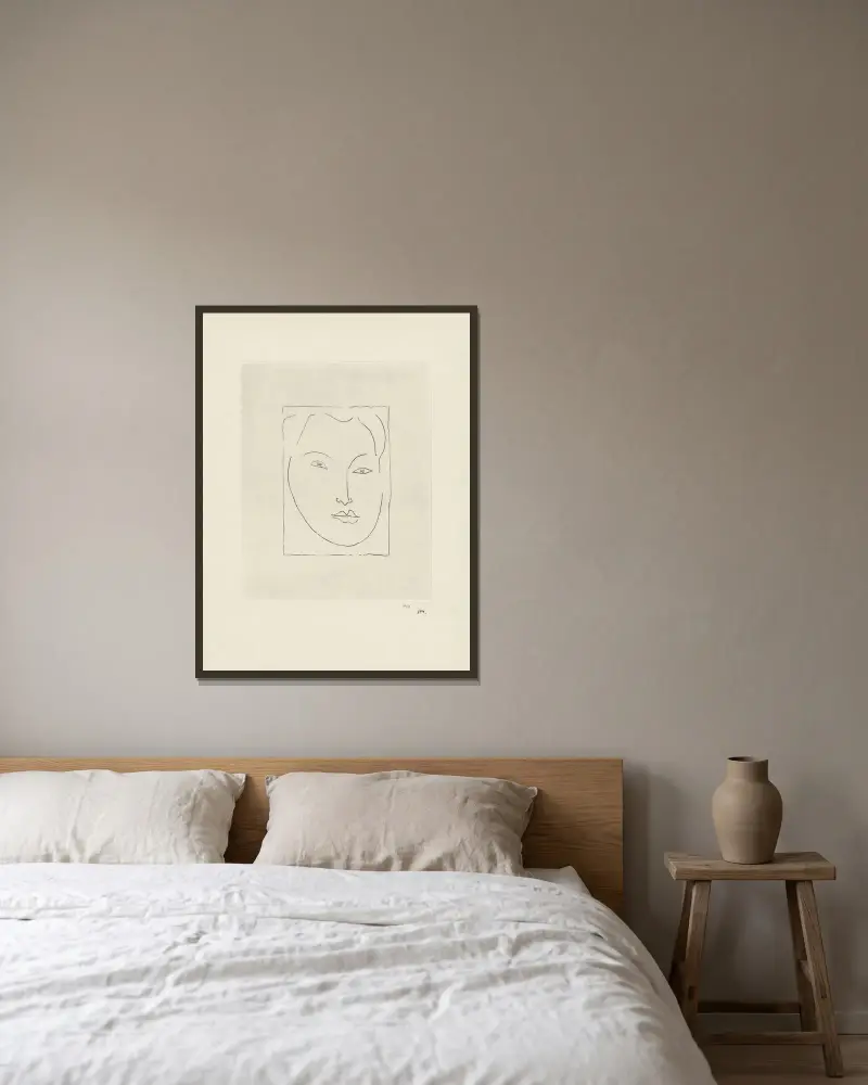 Jeune homme – Masque av Henri Matisse inramad på en vägg