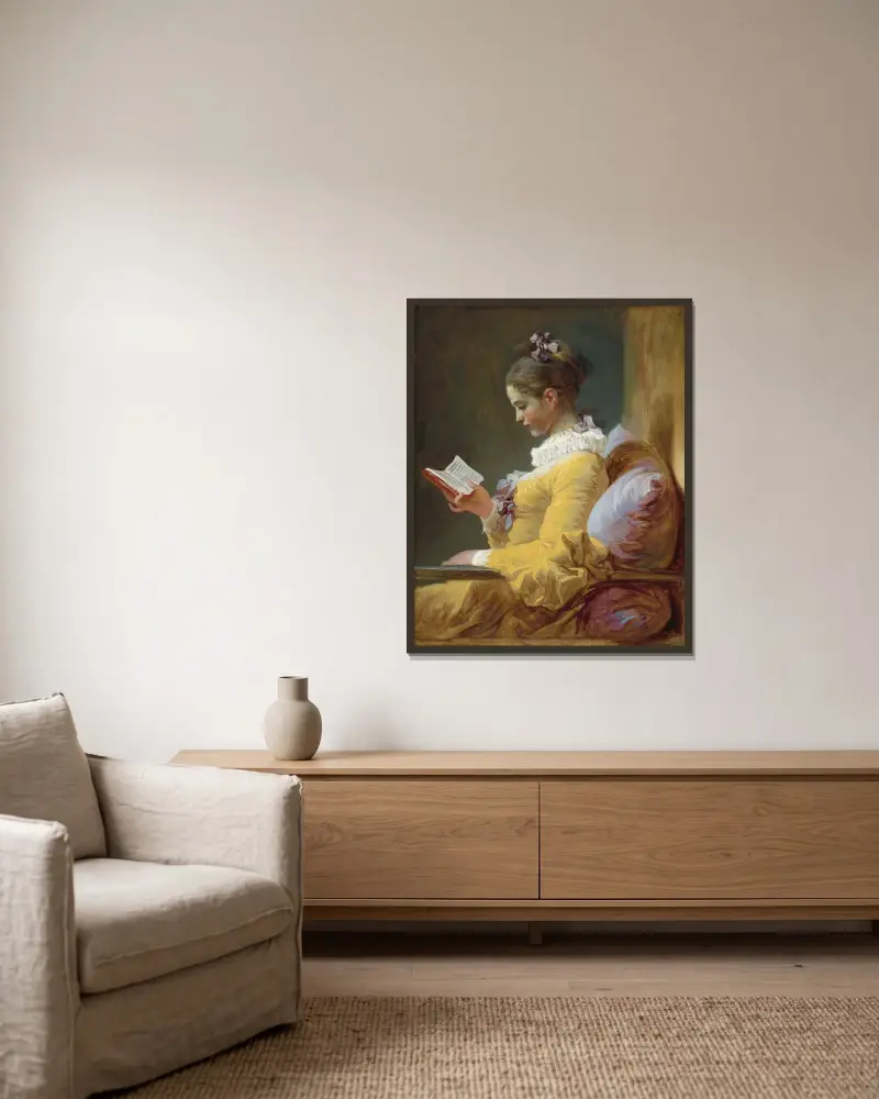 Young Girl Reading av Jean-Honoré Fragonard inramad på en vägg