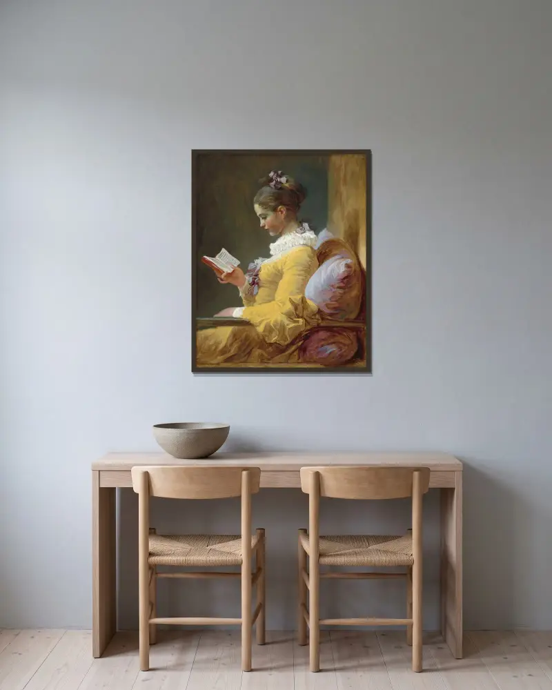 Young Girl Reading av Jean-Honoré Fragonard inramad på en vägg