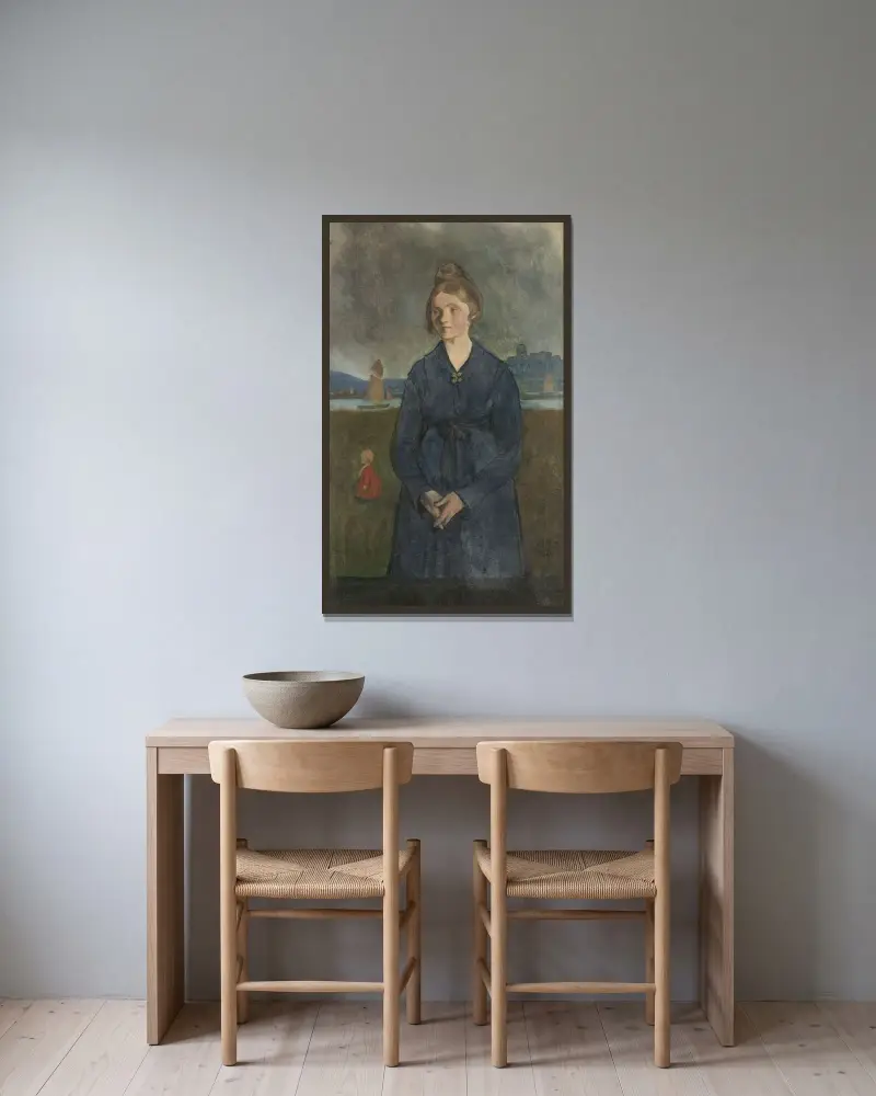 Eva med Bohus fästning i bakgrunden av Ivar Arosenius inramad på en vägg