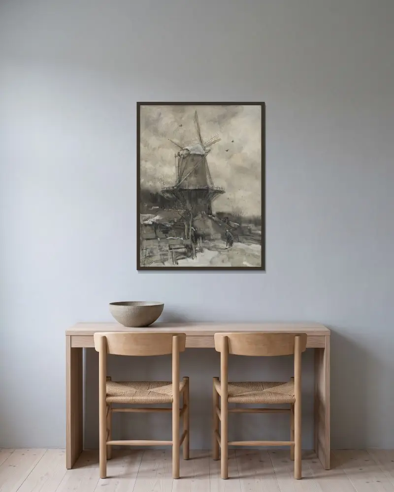 Een molen in de winter av Jacob Maris inramad på en vägg
