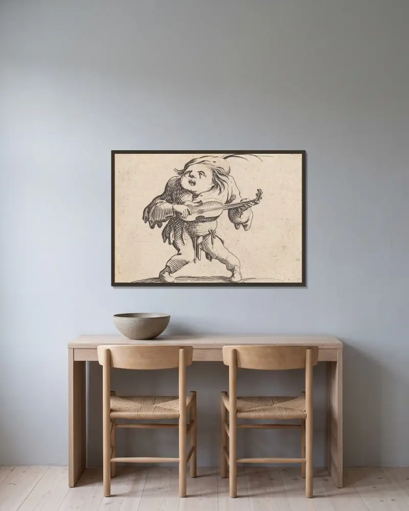 Le bancal jouant de la guitar av Jacques Callot inramad på en vägg