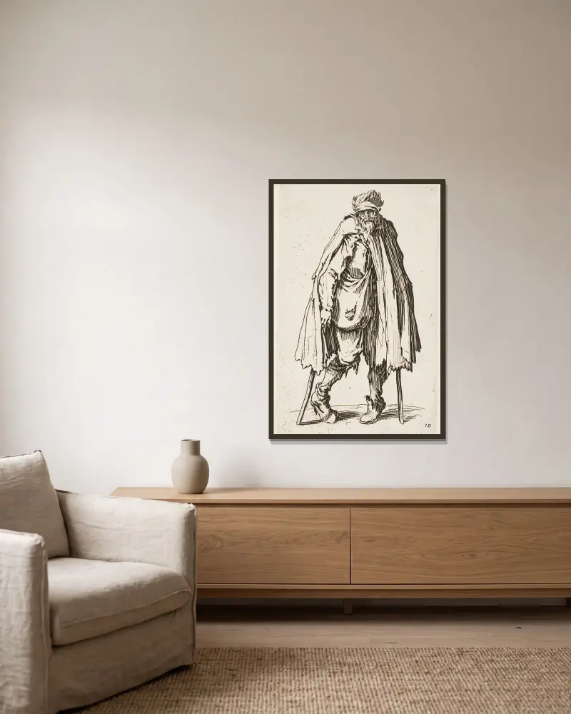 Der Bettler auf Krücken mit einem Sack von Jacques Callot gerahmt an einer Wand