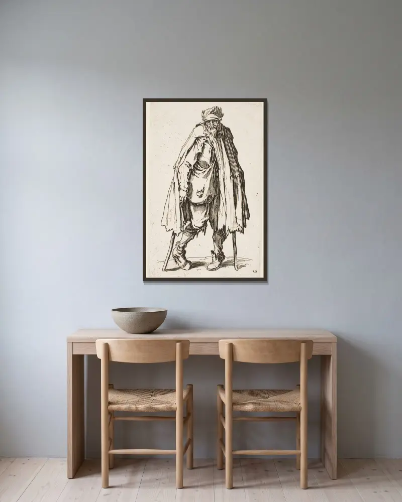 Der Bettler auf Krücken mit einem Sack von Jacques Callot gerahmt an einer Wand