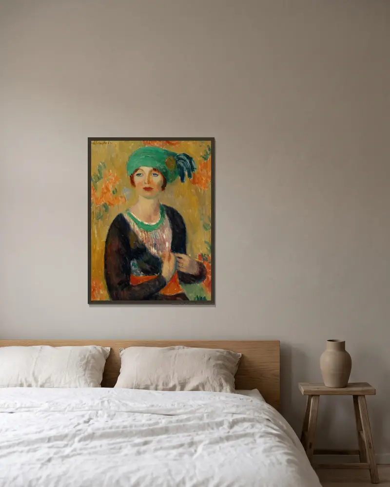Flicka i grön turban av William James Glackens inramad på en vägg