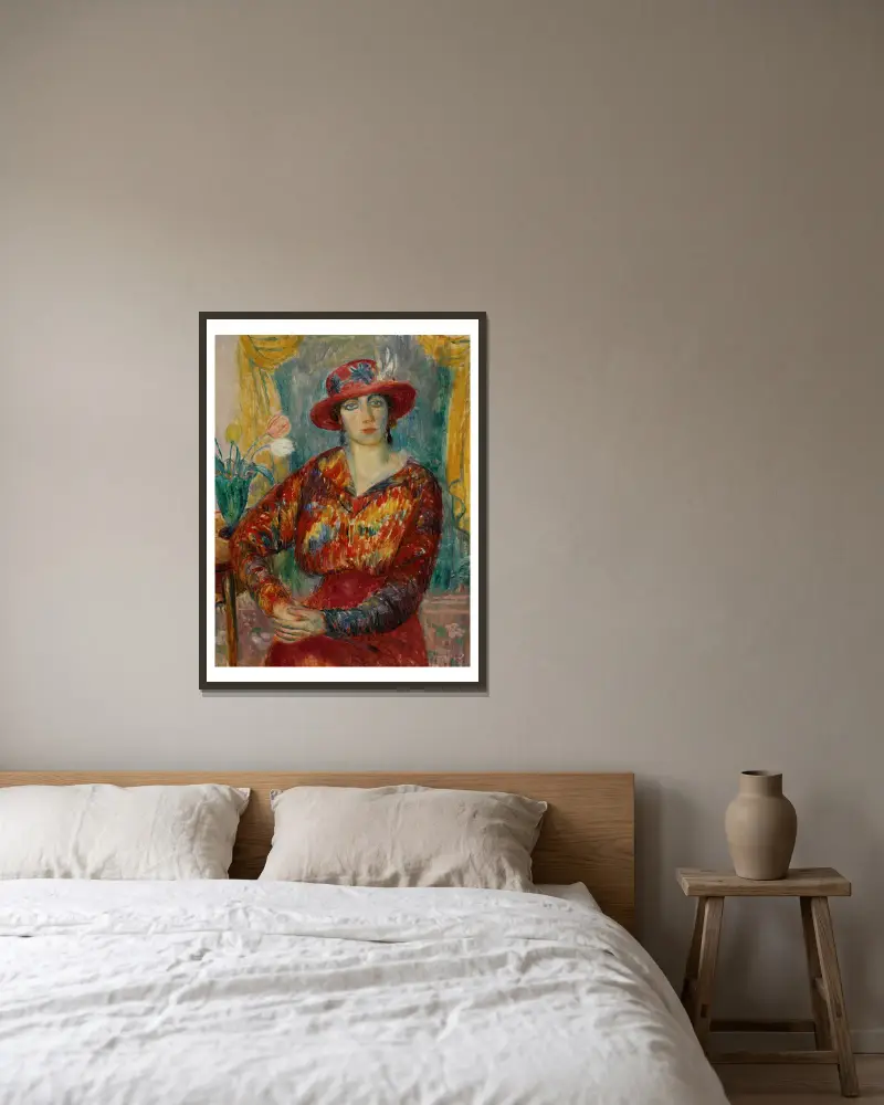 Frau in roter Bluse mit Tulpen von William James Glackens gerahmt an einer Wand