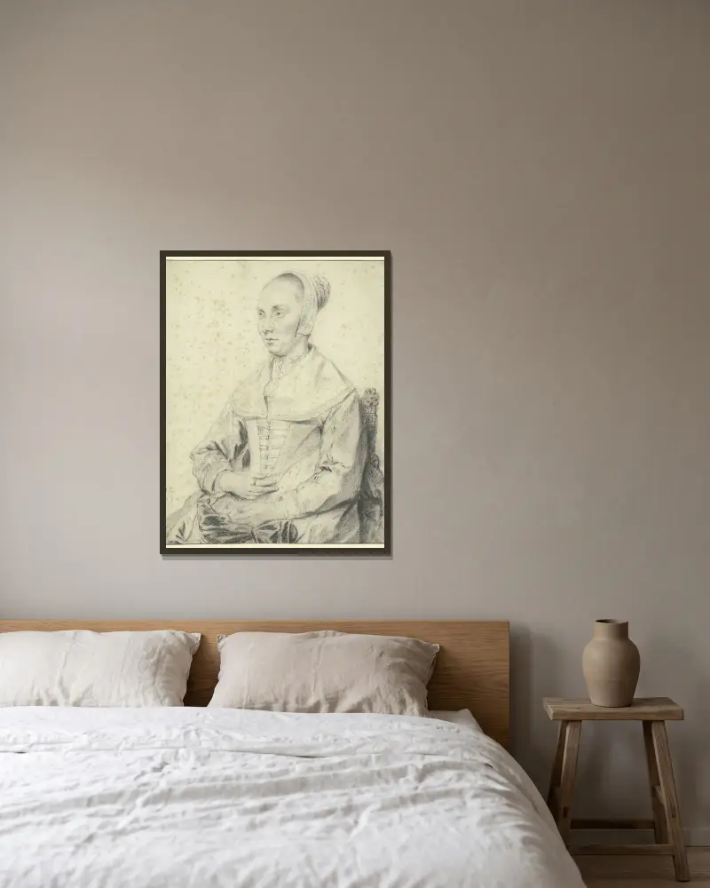 Porträtt av en dam sittande i en fåtölj, vänd åt vänster av Jan Lievens inramad på en vägg