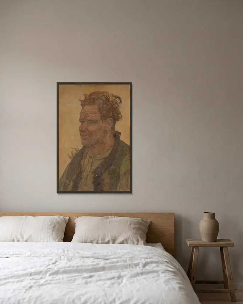 Man med ostyrigt hår av Jan Rembowski inramad på en vägg