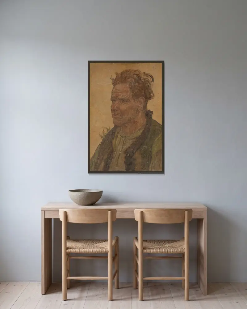 Man med ostyrigt hår av Jan Rembowski inramad på en vägg