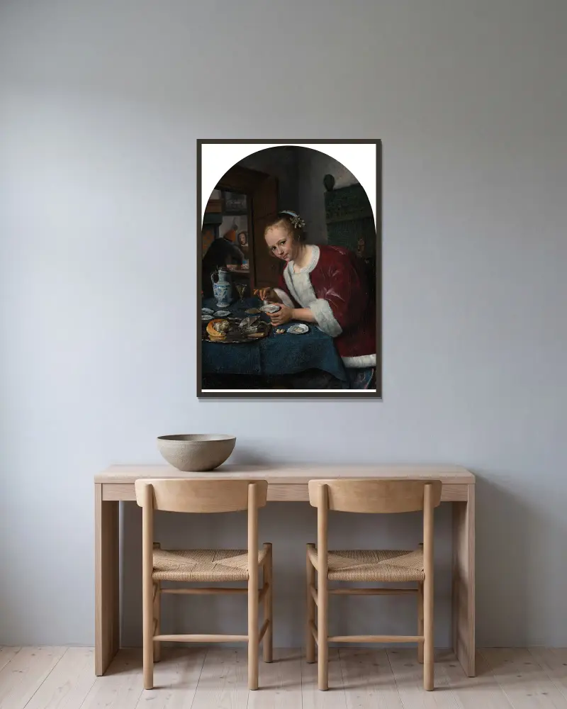 Flicka som äter ostron av Jan Steen inramad på en vägg