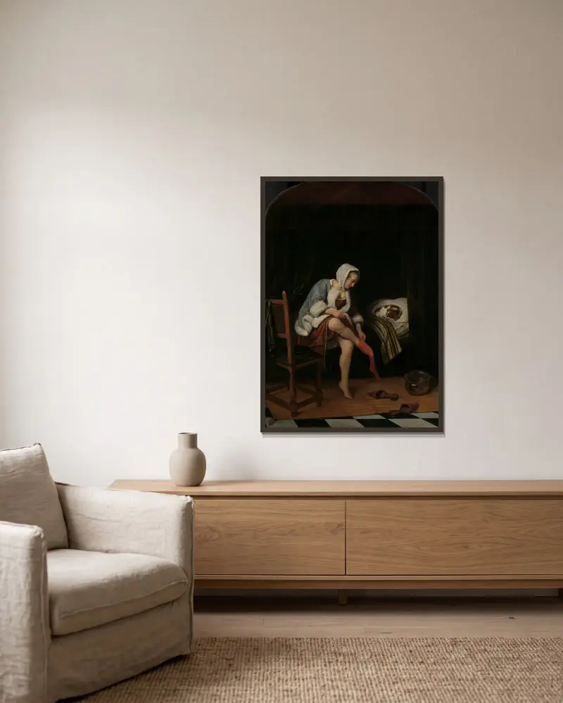 Kvinna vid sin toalett av Jan Steen inramad på en vägg