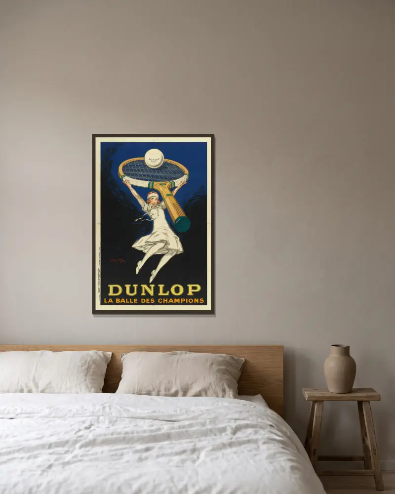 Dunlop – mästarnas boll av Jean d'Ylen inramad på en vägg