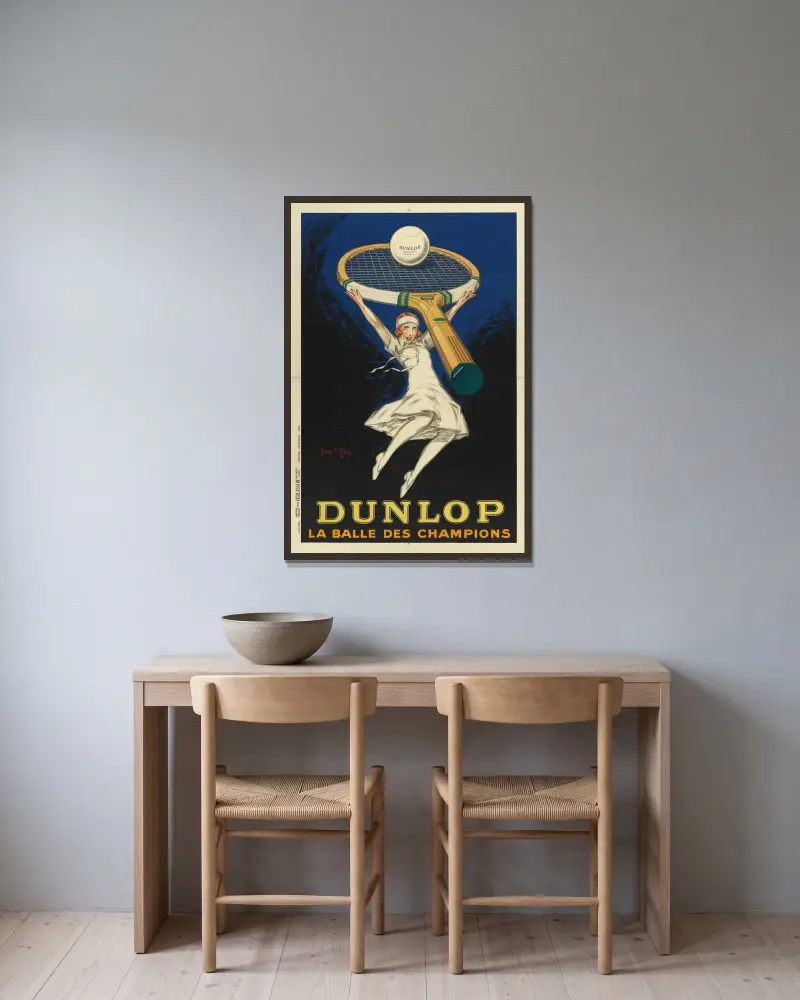 Dunlop – mästarnas boll av Jean d'Ylen inramad på en vägg