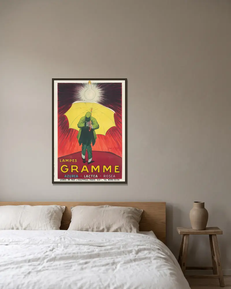 Lampes Gramme av Jean d'Ylen inramad på en vägg