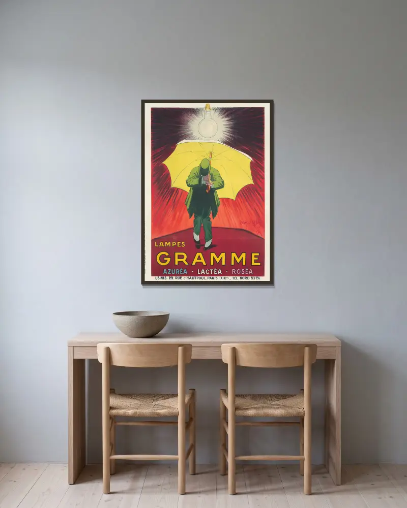 Lampes Gramme av Jean d'Ylen inramad på en vägg