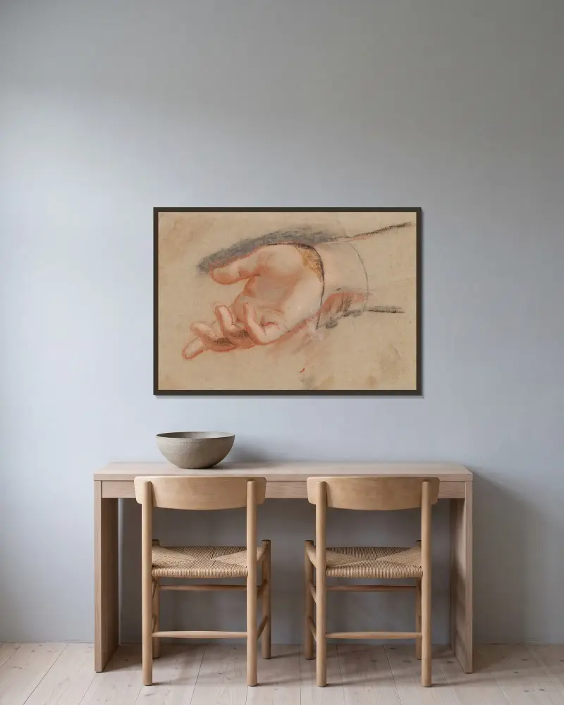 Pastelstudie til en udstrakt hånd av Jens Juel inramad på en vägg