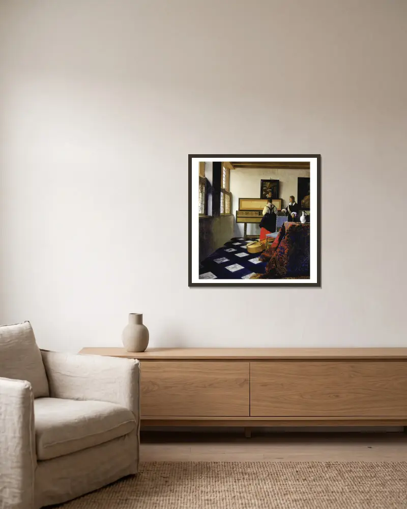 Musiklektionen av Johannes Vermeer inramad på en vägg