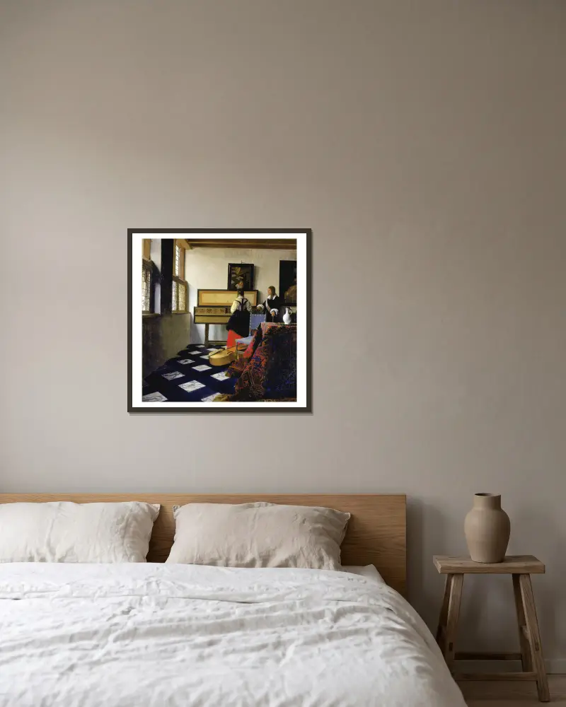 Musiklektionen av Johannes Vermeer inramad på en vägg
