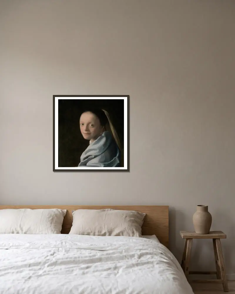 Study of a Young Woman av Johannes Vermeer inramad på en vägg